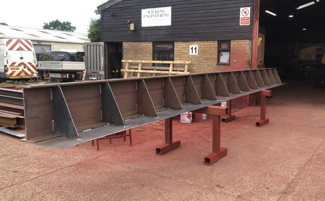Large steel girder fabricated outside the engineering workshop